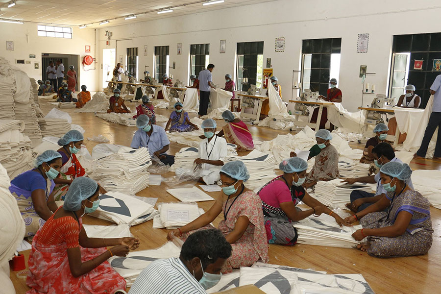 Women working with organic cotton fabric